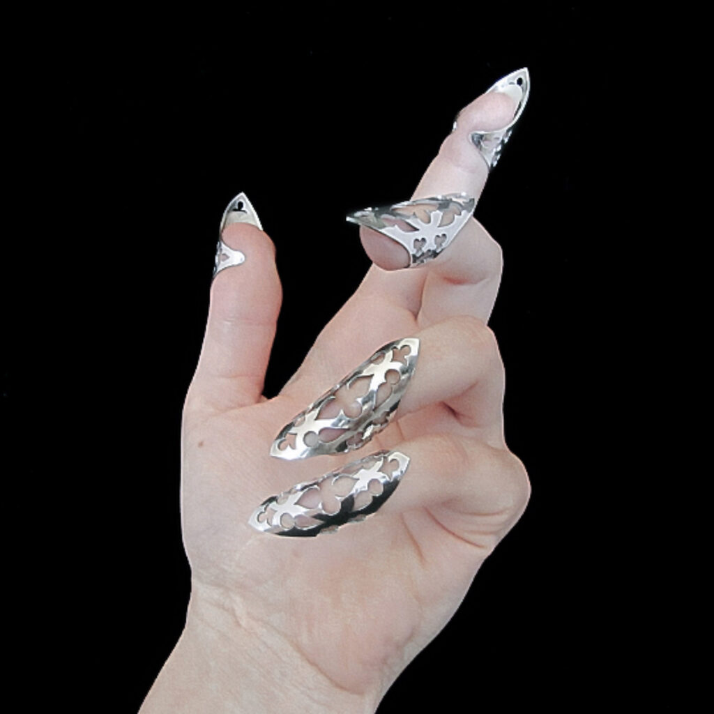 finger tip claw rings